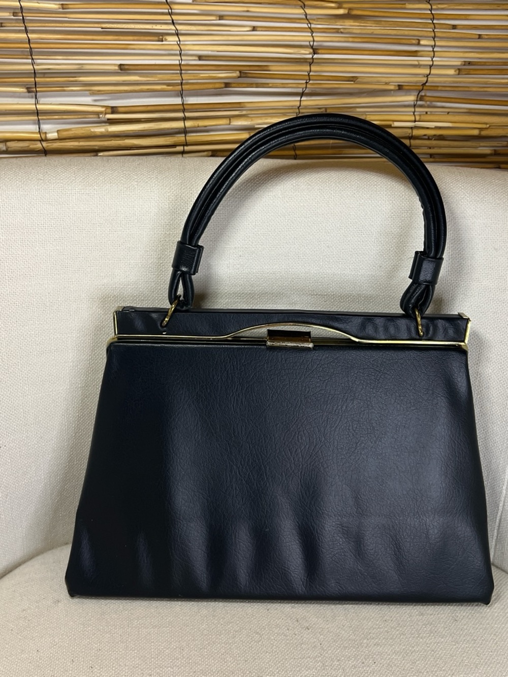Structured Black Top-Handle Satchel with Gold Trim